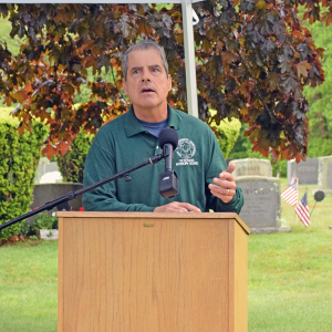 Robert Mohawald of the Veteran's Affairs office speaks. 