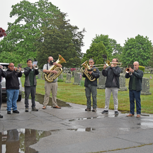 The Dartmouth Community Band performed the National Anthem. 