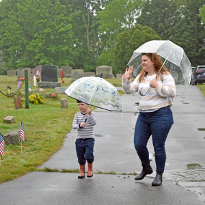 Dayna and Benjamin (age 4) Kingsland walk into the ceremony.