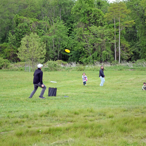 The Kenney family enjoying the lawn games. 