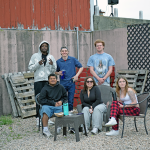 A friend groups poses. 