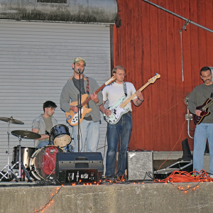 The live band Interzone performs. 