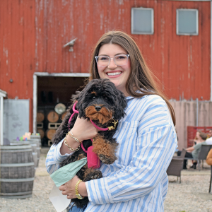 Mackenzie Rubitschung with her dog. 