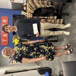 Kathy Tibbetts, Scholarship Chair presenting an award to Nicholas Parks.