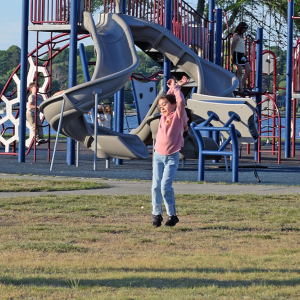 Nora Furtada, 7, enjoys the music. 