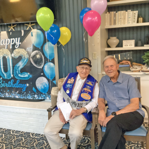 Enos and Tom at his birthday party. Source: Marjorie Roche