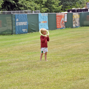 Gavin Tocci plays with a frisbee. 