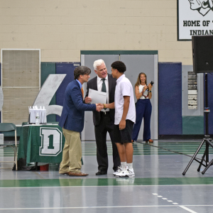 Anderson DeCruz receives the Karen Marchand Award. 