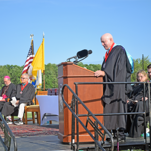 President of Bishop Stang James Benson speaks. 