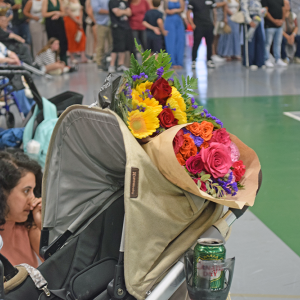 The gym was filled with flowers for the graduates. 