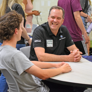 A "Ripple Award" honeree smiles at the student who awarded him. Photos by Kat Sheridan
