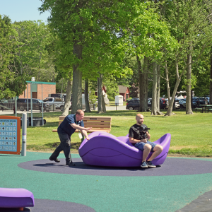 Members of the Dartmouth Community media enjoy the play set. 