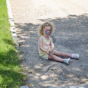 Charlotte, 2.5, plays in the sand. 