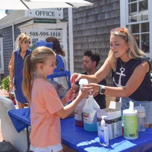 Taegan Carter, 12, gets a free snowcone. 