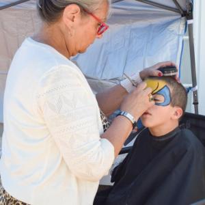 Noah, 5, gets his face painted. 