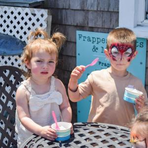Dylan, 2, and Luka, 4, enjoy a free kiddie ice cream. 