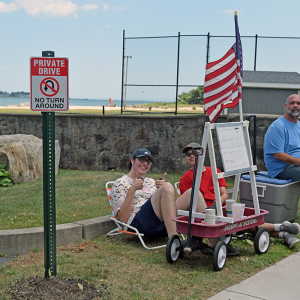 Some boys sold lemonade at Jones Beach. 
