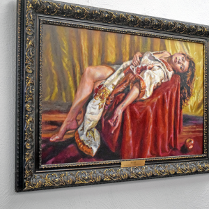 A woman lounging on a chair. 