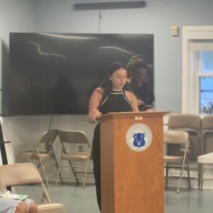 Rachel Dzialo speaks to the crowd. 