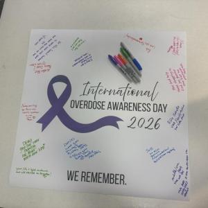 The poster with messages to loved ones. Photos by Kat Sheridan