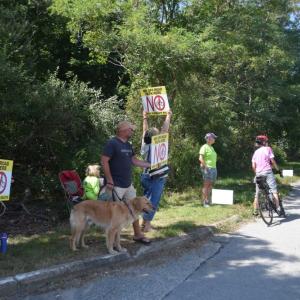 Protesters outside Running Brook Vineyard. 