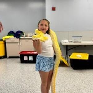 One of the campers hold a snake. Source: Humane Society and Shelter Southcoast Facebook