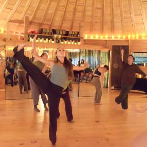 The group dances together. 