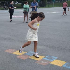 Ellie Sousa, 6, plays hop scotch. 