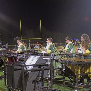 The drumline started off halftime. 