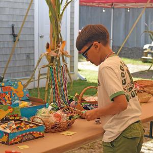 Daniel, 9, explores some of the prizes. 