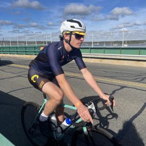 A rider passes over the Padanaram Bridge.