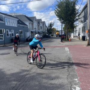 Riders turn onto Elm Street. 