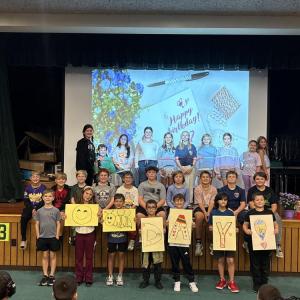 Students pose with Pauline Tavares. Photos by Kat Sheridan