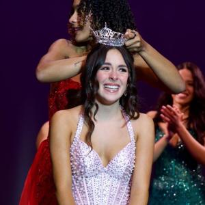 Avery Barboza being crowned by Deolinda Mendes. Source: Ashley Bendiksen