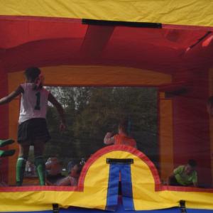 The kids enjoyed the bounce house. 