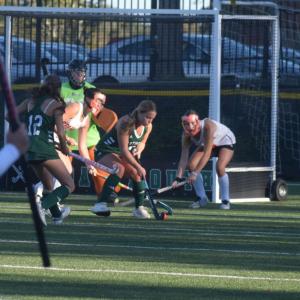 A Dartmouth and Barnstable player battle for the ball. 