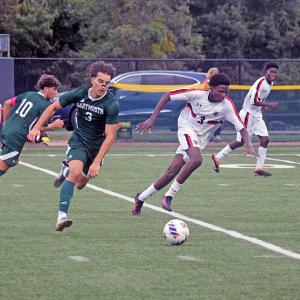 Logan Stott runs for the ball. 