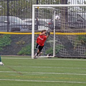 Logan Pedro stops a kick. 