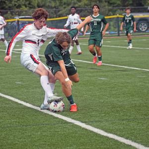 Logan Soares tries to get the ball. 