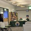 Catie Paveo explains the CKLA program to the committee. Photo by Kat Sheridan