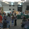 The Invention Convention team gives Silly Soap Stamps to the School Committee. Source: DHSTVmedia