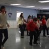 Students and members of the Council on Aging dance together. Photos by Kat Sheridan