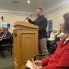 Principal engineer Christian Farland speaks at the Zoning Board of Appeals meeting. Photo by Kat Sheridan