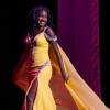 Kercheena Pamphile wears a yellow gown that represents her personality. Photos by Steve Smith Photography