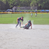 A player slides to base. Photos by Kat Sheridan