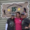 Commissioners Courtney Cohen and Nicole Mello pose with Sherri Tetrault. Photos by Kat Sheridan