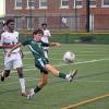 Casey Martinho keeps the ball from going out of bounds. Photos by Kat Sheridan