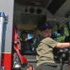 Two kids explore the fire truck. Photos by Kat Sheridan