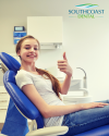 Smiling teen in dental chair